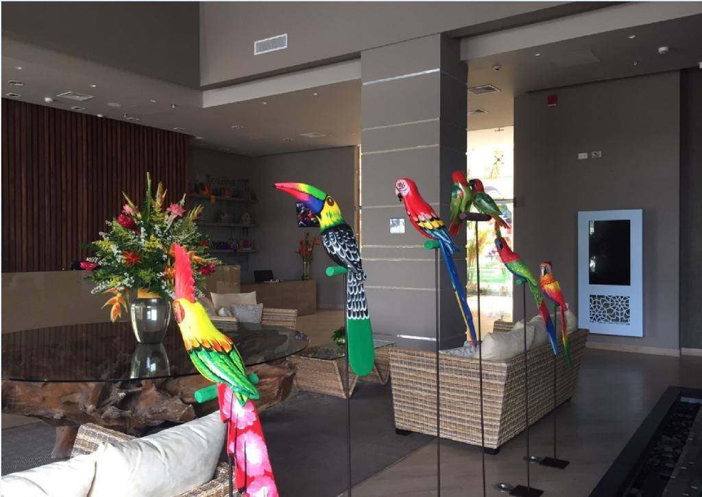 Ghl Hotel Montería Exterior photo Parrots at the lobby