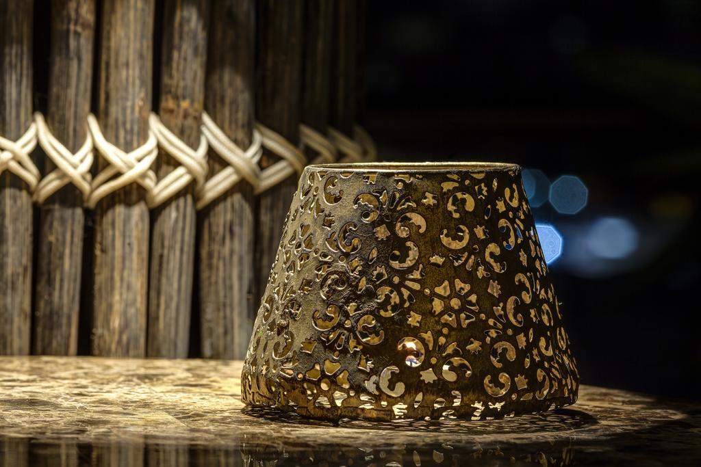 Ghl Hotel Montería Exterior photo A candle holder